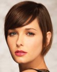 Short hair with smooth styling and a low side part