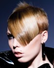 Modern short hair design with long and very sleek bangs