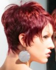 Short red hair with dark orange highlights