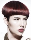 Mushroom shape haircut with clipper cut sides and neck