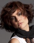 Chic short hairstyle with ends that swing upward