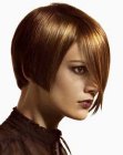 Jaw length bob with bangs that cover half of the face