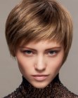 Soft short hairstyle with blending layers and diagonal styling