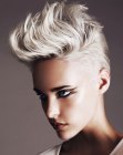 Pixie haircut with very short sides and spikes