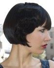 Shiny black bob with bangs and vintage elements