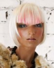 Platinum blonde chin length bob with pink color accents