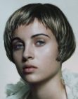 Short 1920s inspired bob haircut with narrow bangs