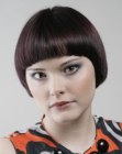 Sleek short hairstyle with elements of the Purdey look