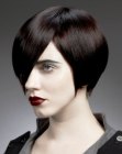 Short asymmetrical hairstyle that covers one eye