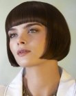 Classic short bob with a shorter neck section and full bangs