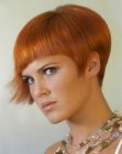 Short style with bangs for coppery red hair