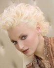 Short platinum blonde hair with curls