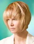Short hairstyle with longer forward lengths that frame the face