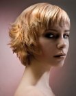 Short layered hairstyle with ruffled and straight sections