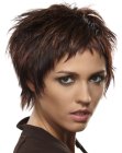 Edgy short haircut with choppy cutting lines and sideburns