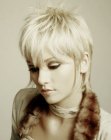 Blonde pixie cut with an elongated nape section