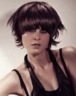 Round and feathered short hair with curved bangs