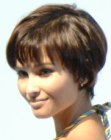 Glossy pixie cut with partly bare ears