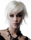 Short platinum blonde hair with textured ends