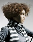 Short hair with thick curls and styled in an A-shape