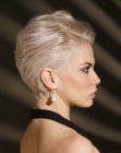Hair with a very short neckline and brushed back styling