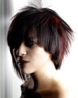 Short hairstyle with blunt angled edges and free hand chopping