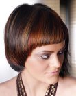 Hairdo with the bangs cut high above the eyebrows
