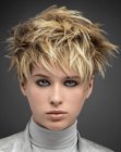 Blonde pixie cut with spiked layers and a jagged appearance