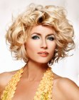 Short hairstyle with thick and full blonde curls