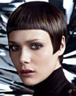 Short haircut with horizontal bangs and a V-shape nape