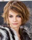 Short haircut with thick layers and a shorter back