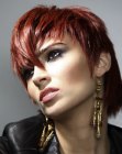 Short hairstyle with a long neck section and influences of punk
