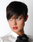 Short haircut with sleek lines and layering