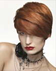 Short red hair with heavily tweaked layers