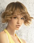 Bob cut with flipped-out ends and face-framing layers