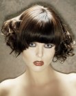 Short hair with billowing curls and sleek bangs