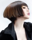 Short stacked bob with blunt bangs for Asian hair
