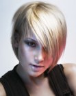 Blonde inverted bob with soft edges and a light finish