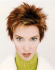 Choppy pixie cut with razor cutting for ginger-red hair
