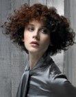 Short wedge shaped hair with curls