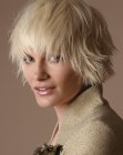 Short bob with box layering and styling for an outward flick