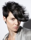 Short boyish haircut with a very long fringe for women