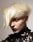 Platinum blonde hair styled over one of the eyes