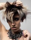 Punk look with short irregularly textured hair for women