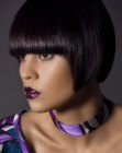 Smooth chin length bob with sharp horizontal bangs