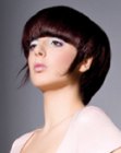 Daring haircut with elongated strands in front of the ears