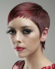 Very short hairstyle with a blunt line around the face