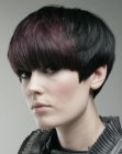 Female haircut with a short nape and a helmet shape