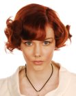Strong and modern short hairstyle for red hair with curls
