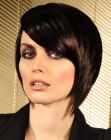 Concave bob haircut with elongated forward lengths